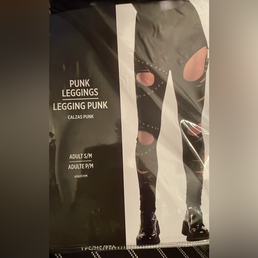 PUNK LEGGINGS Cool Black Leggings w/ cool attachments.Yes the fronts have holes